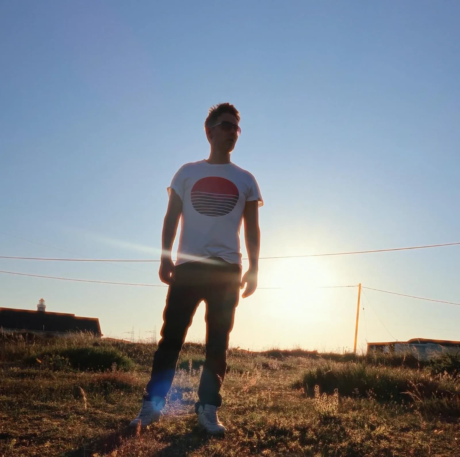 Phil silhouetted against a low sun
